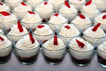 Bowl of whipped chocolate cream in row