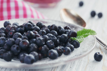 Delicious bilberry smoothie with fresh berries. Fresh yogurt wit