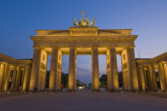 The Brandenburg Gate with the Quadriga winged victory statue on top illuminated at night, Pariser Platz, Berlin, Germany