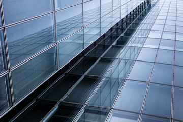 Fototapeta na wymiar Business building, office buildings. Modern glass silhouettes on