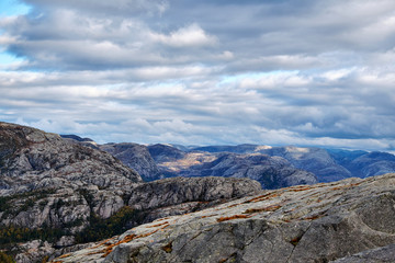 Soft shaped landscape of mountain tops on the way to the pulpit Rock in Norway