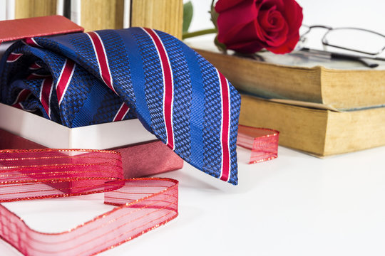 Necktie In Red Gift Box On The Table For Father Day Concept