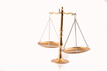 Golden scales of justice - the symbol of law