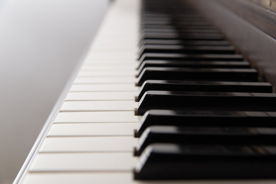 Closeup of the keys of a grand piano