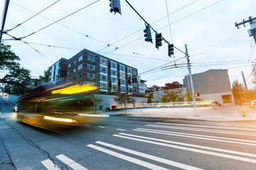 blur moving bus at road intersection in seattle