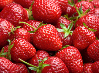Strawberry background.  Red ripe organic strawberries on market - 113303593