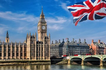 Fotobehang Big Ben with flag of United Kingdom in London, UK © Tomas Marek