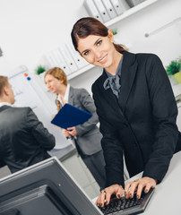 business woman working at computer in office