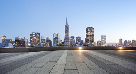 empty pavement with cityscape and skyline of san francisco at tw