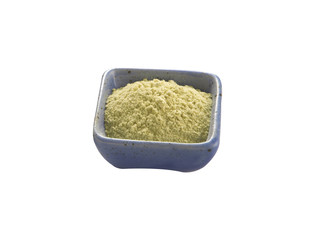 japanese wasabi in ceramic cup on white background