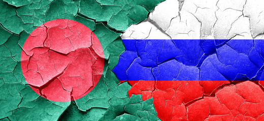 Bangladesh flag with Russia flag on a grunge cracked wall
