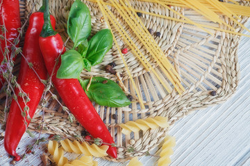 Italian food background, with tomatoes, basil, pasta, olive oil,