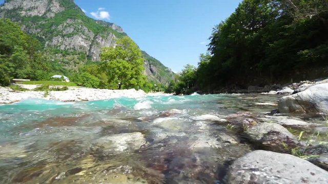 Fast river with blue water  in Valbona in Albanian Alps, Albania.