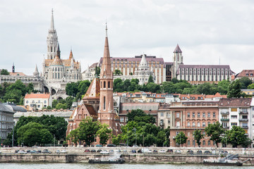 Matthias church, Fishermans bastion and Calvinist church in Buda