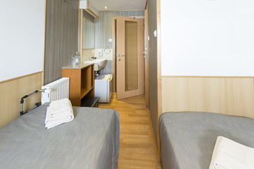 Interior of a cabin bedroom on cruise boat hotel