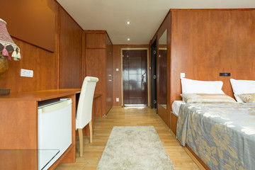 Interior of a cabin bedroom on cruise boat hotel