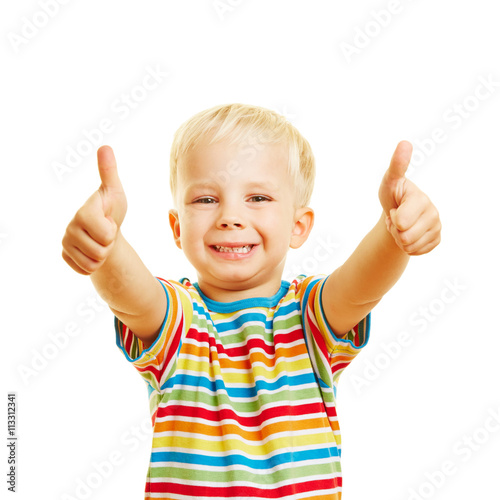 "Glückliches Kind hält Daumen hoch" Stock photo and royalty-free images