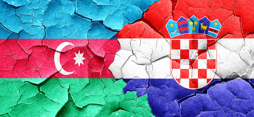 Azerbaijan flag with Croatia flag on a grunge cracked wall