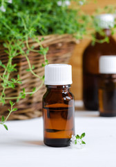 Small bottle of essential thyme oil