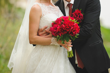 Groom Hugging Bride