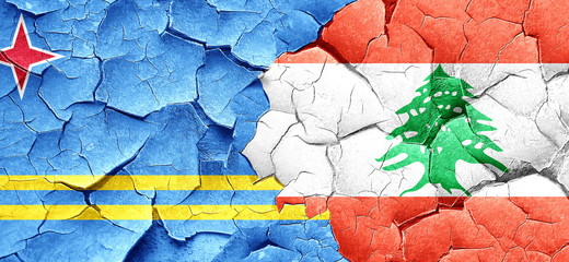 aruba flag with Lebanon flag on a grunge cracked wall