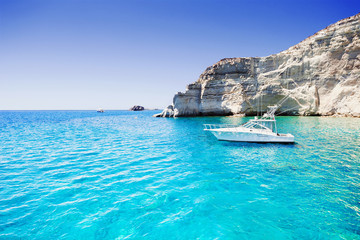 Naklejka premium Sailboat in a beautiful bay, Milos island, Greece