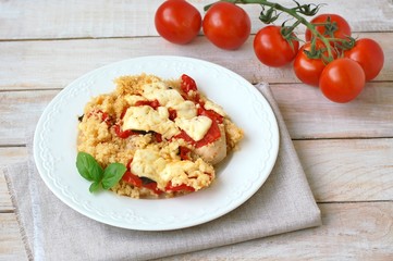 Chicken fillet withe potatoes, cheese, basil and couscous