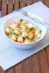 Healthy vegan meal with tofu,peas,carrot,sweet corn and whole grain rice