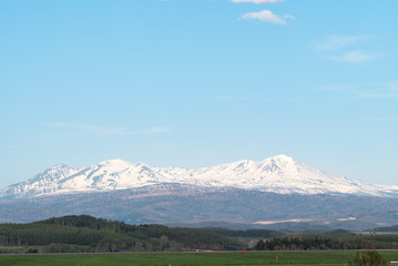 daisetuzan seen from Asahikawa Airport , Blue sky , with copy sp
