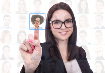 job search concept - businesswoman pressing an imaginary buttons