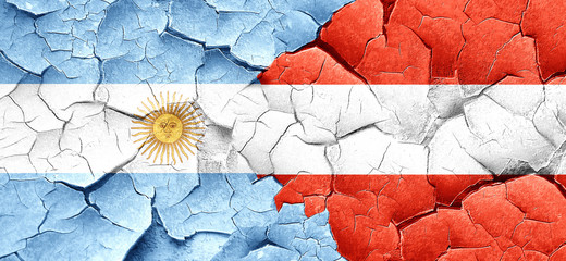 Argentina flag with Austria flag on a grunge cracked wall