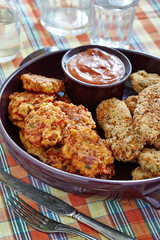 chicken stripes , chops and tomato ketchup in the pot