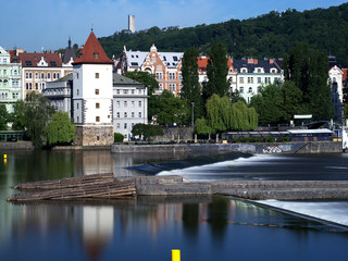 Fototapeta premium Janacek Embankment in Prague with Malostranska water tower in the foreground
