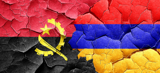Angola flag with Armenia flag on a grunge cracked wall