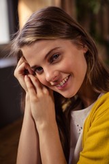 Fototapeta premium Smiling casual woman alone