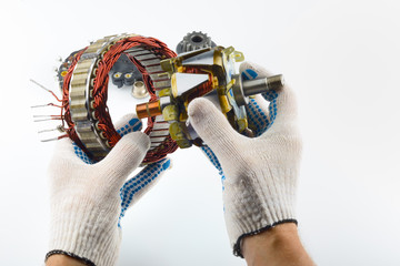The electrical part of the generator in the hand