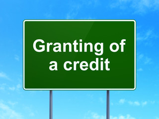 Money concept: Granting of A credit on road sign background