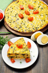 Homemade omelet on white plate