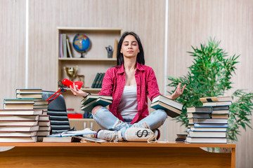 Young female student preparing for college school exams