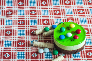 Sweet cake with kiwi. Colorful sweet, very sweet and attractive. Saturated colors. Birthday Cake. Kiwi Cake.