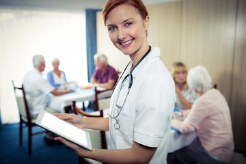 Portrait of a nurse with tablet computer