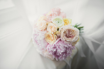 Wonderful luxury wedding bouquet of different flowers
