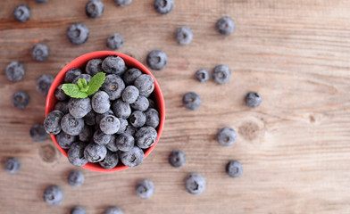 Fresh blueberry on wooden background