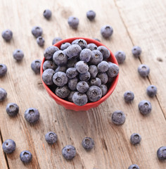 Fresh blueberry on wooden background