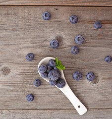 Fresh blueberry on wooden background