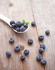 Fresh blueberry on wooden background
