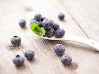 Fresh blueberry on wooden background