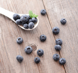 Fresh blueberry on wooden background