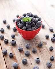 Fresh blueberry on wooden background
