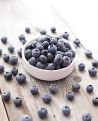 Fresh blueberry on wooden background